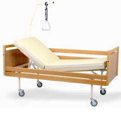 Łóżka rehabilitacyjne pozaszpitalne (do opieki długoterminowej) Metalowiec sp. z o.o. A-4 w obudowie drewnianej